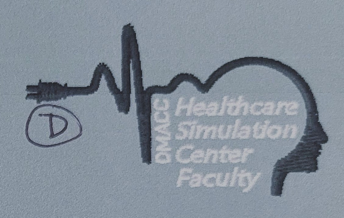 DMACC Simulation Logo for Scrubs