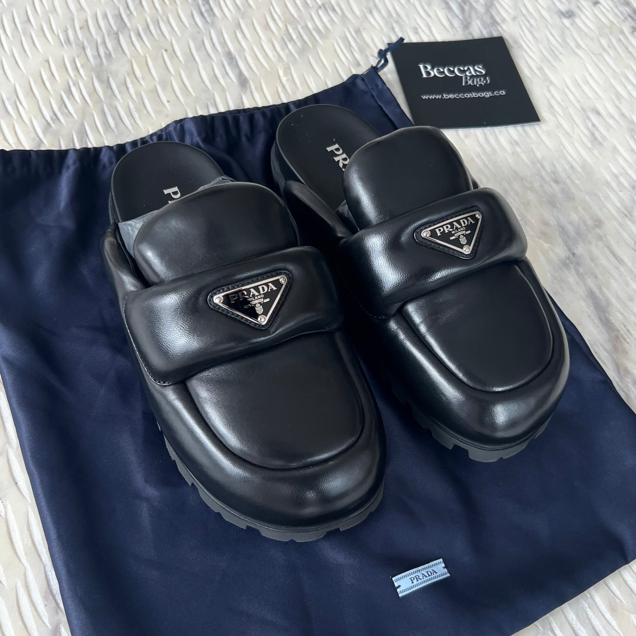 Prada Soft padded nappa leather sabots